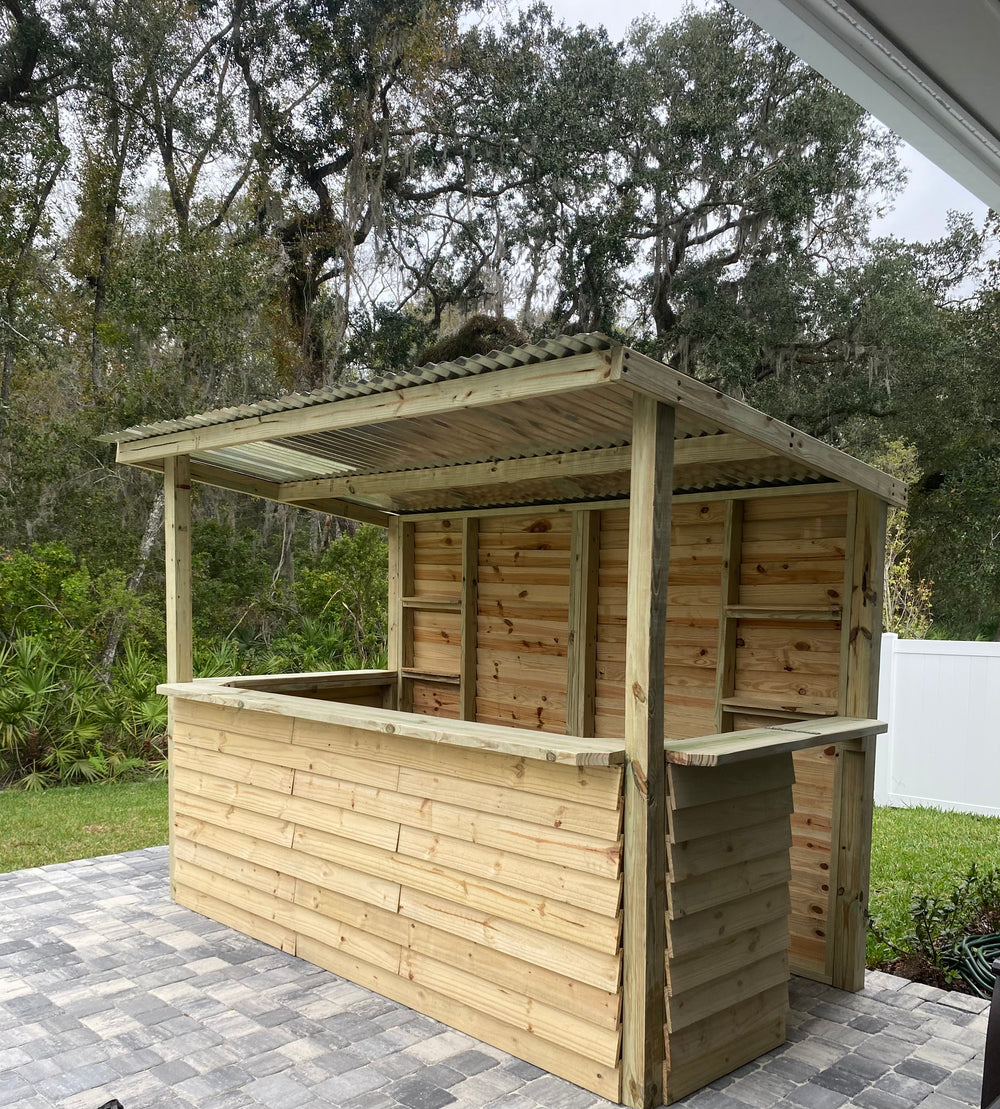 Roofed wooden backyard bar with wraparound counter