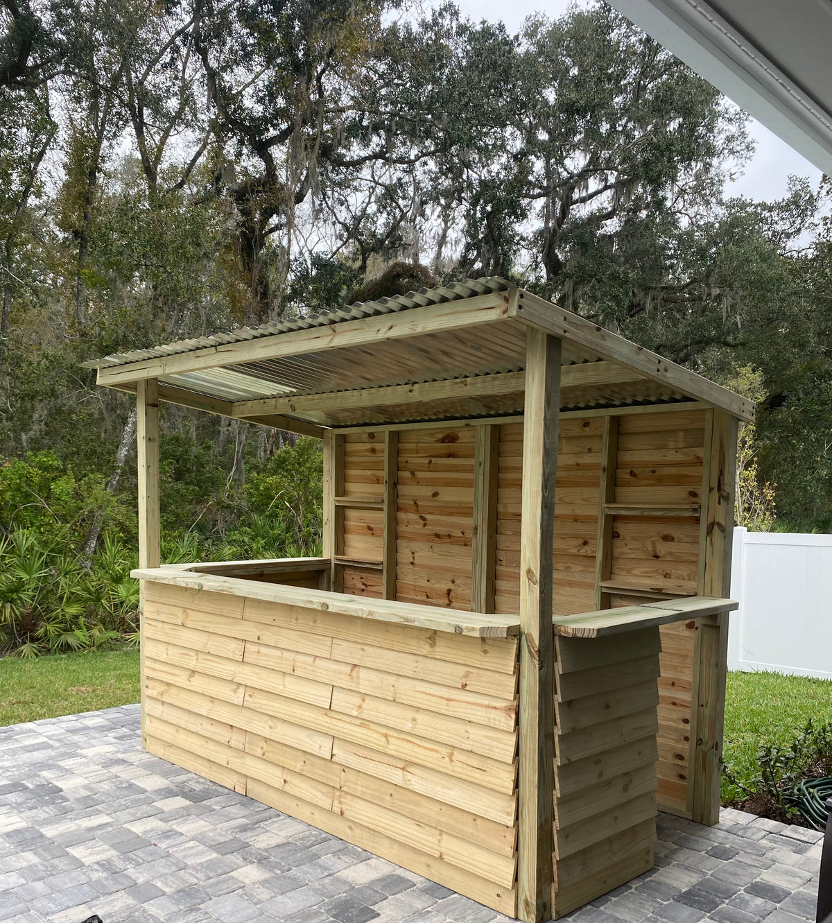 Natural wood BuildABar with roof and serving counter